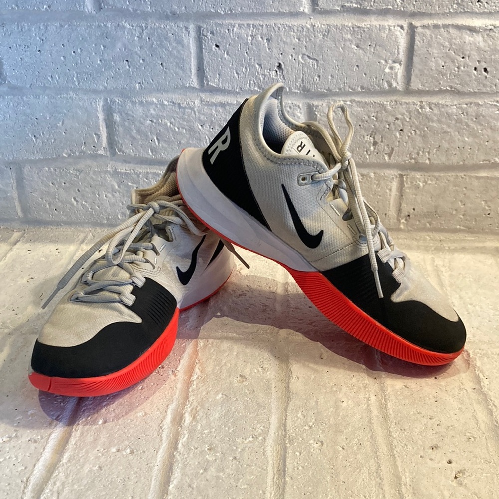 Men’s Nike Air Tennis shoes, 7.5 us. Shoes are specific  for a tennis court.